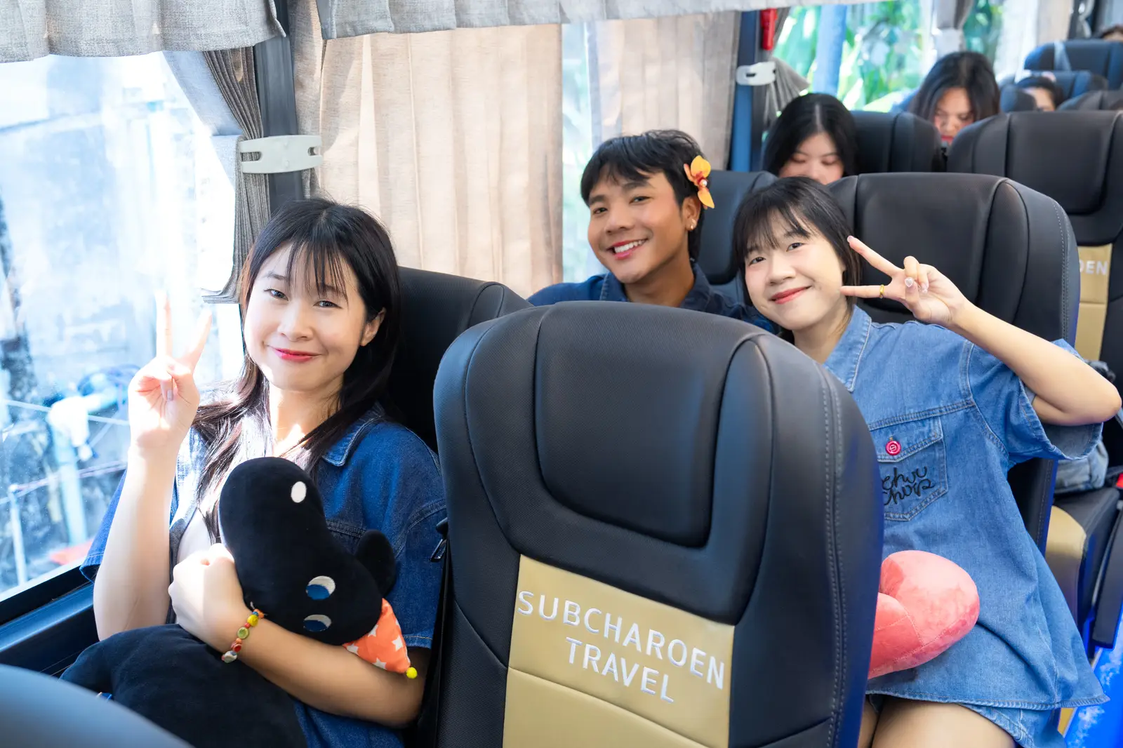 On the coach, ready for the trip