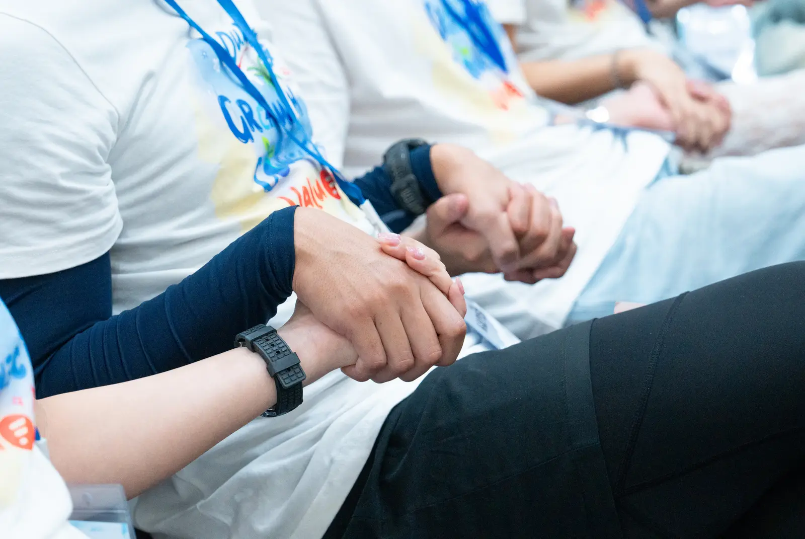 A trust-building exercise: holding hands