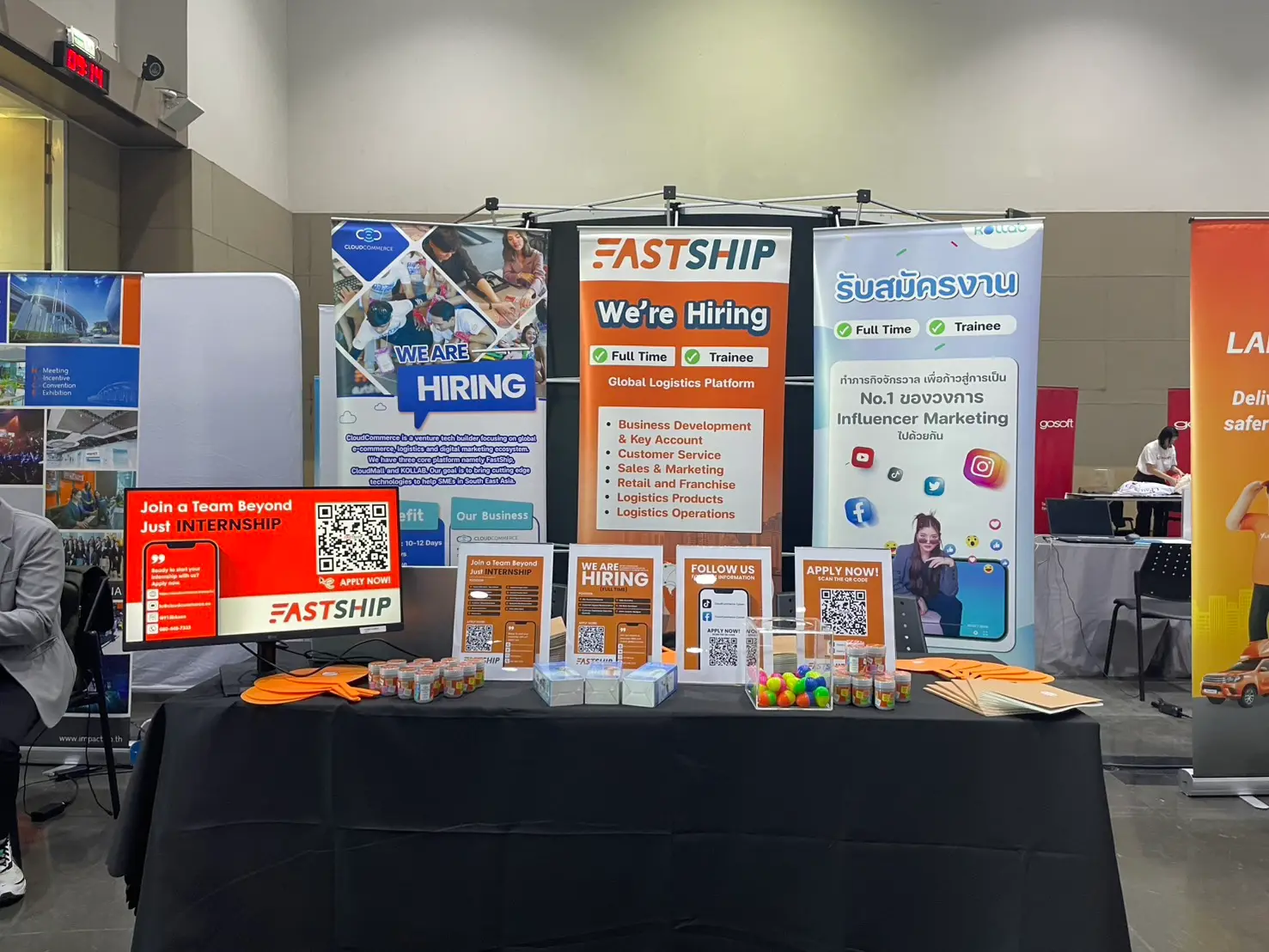 The FastShip booth: hiring banners, QR codes to apply and giveaways